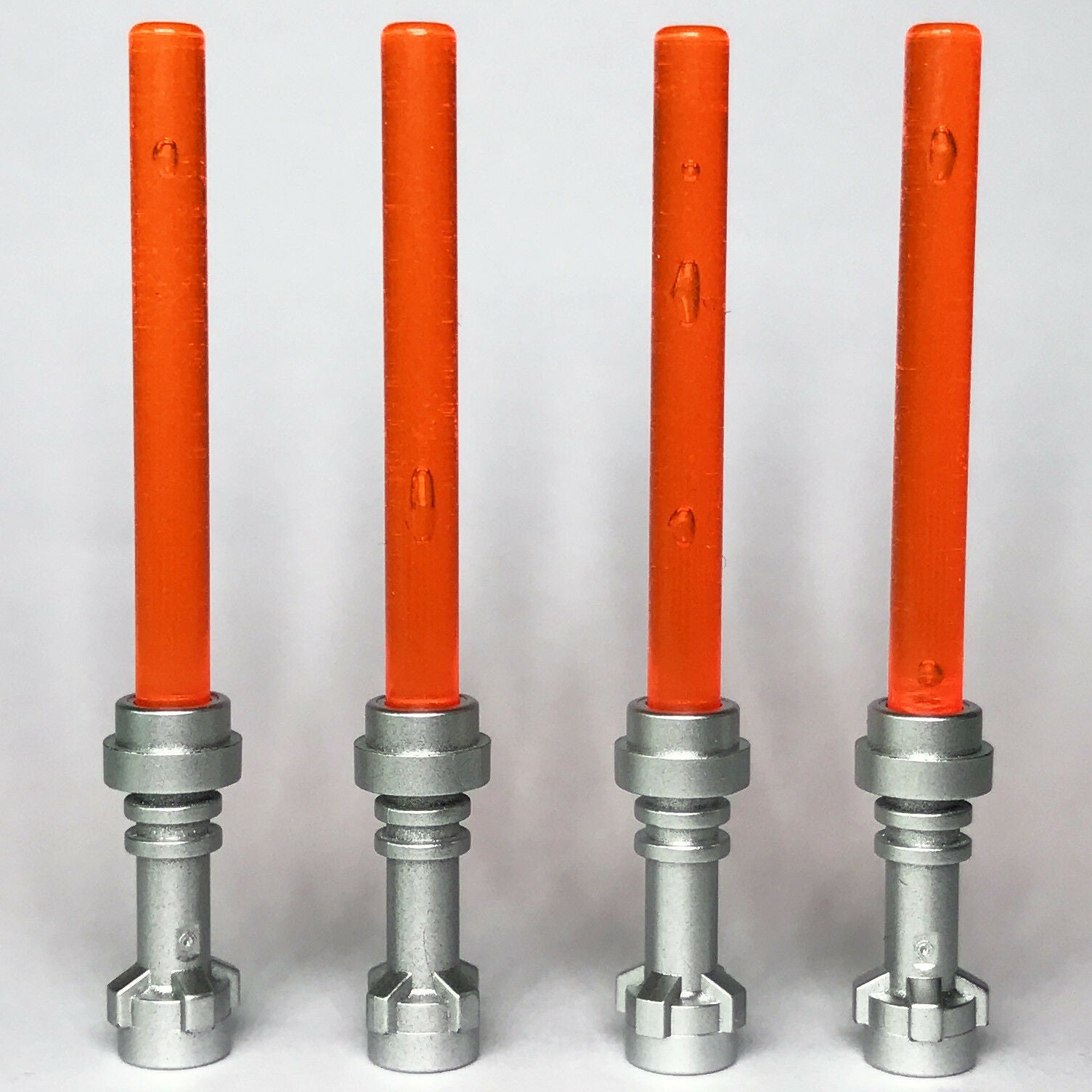 4 x STAR WARS lego TRANSLUCENT ORANGE LIGHTSABERS jedi sith WEAPONS new GENUINE - Bricks & Figures